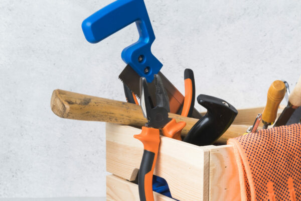 close-up-wooden-toolbox-with-different-tools